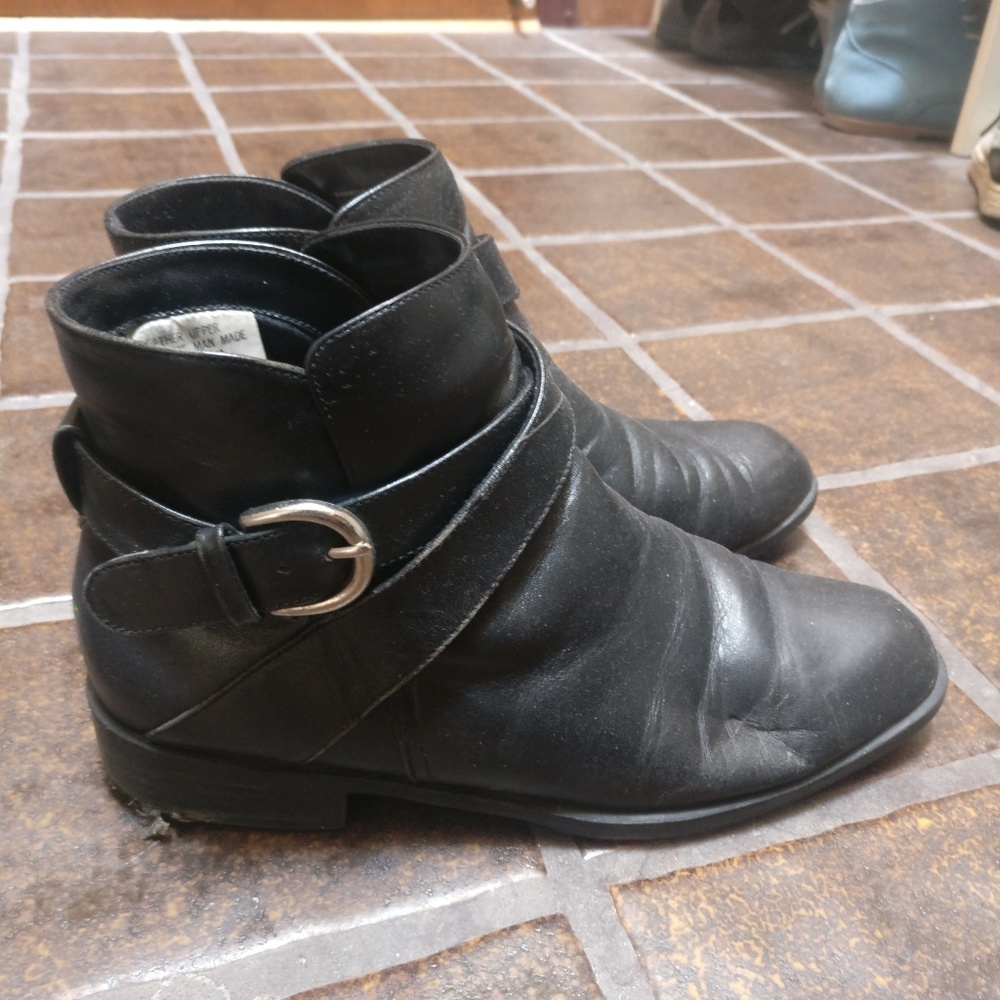 Buttery black leather buckle ankle boots